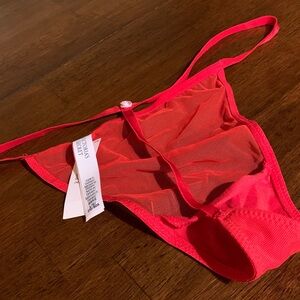 Very sexy authentic V S strings red see throughout panty size L one piece .